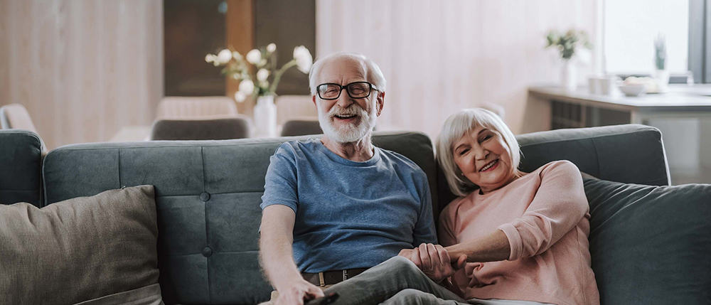 Elderly couple enjoying time together at home